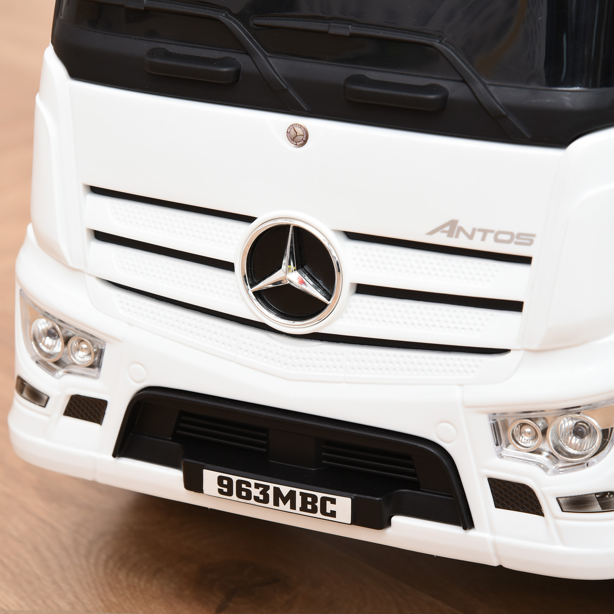 Rutscherfahrzeug Rutscherauto Babyrutscher Kinderfahrzeug lizenziert von Mercedes ANTOS-LKW-Stil mit Licht für Kinder von 12 bis 36 Monaten Metall PP-Kunststoff Weiß+Schwarz 62,5x28,5x45cm